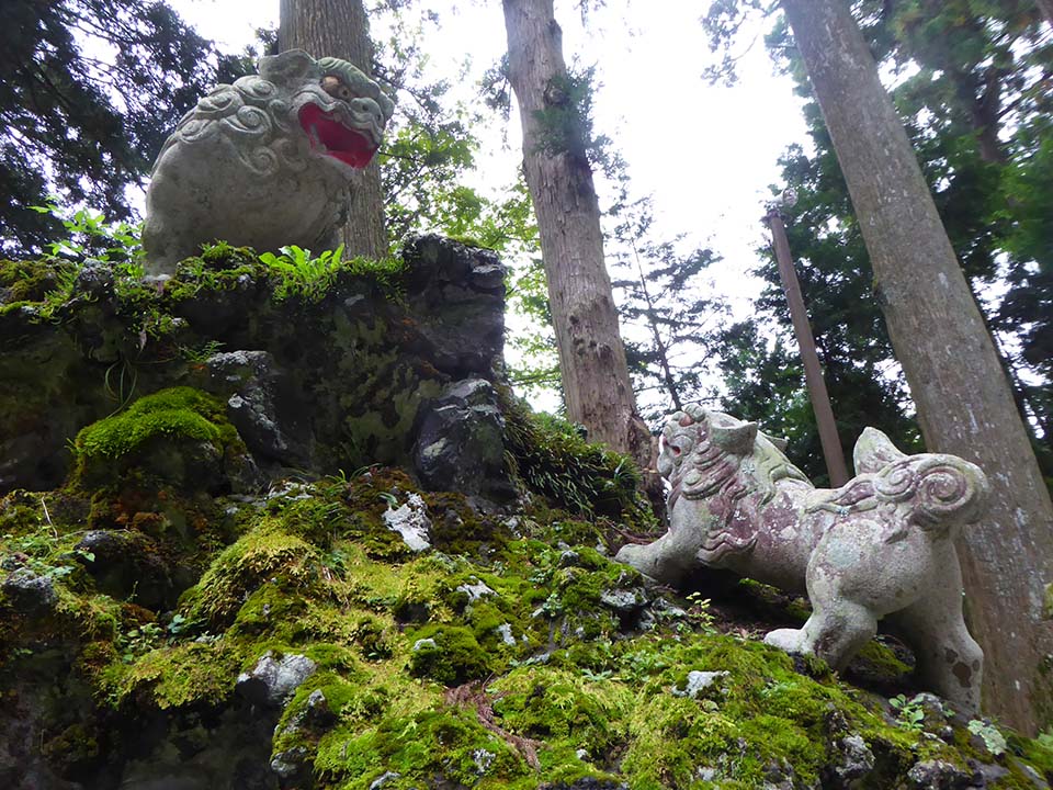 Komainu (guardian dogs) at Fujizuka (mound made in the image of Mt. Fuji)